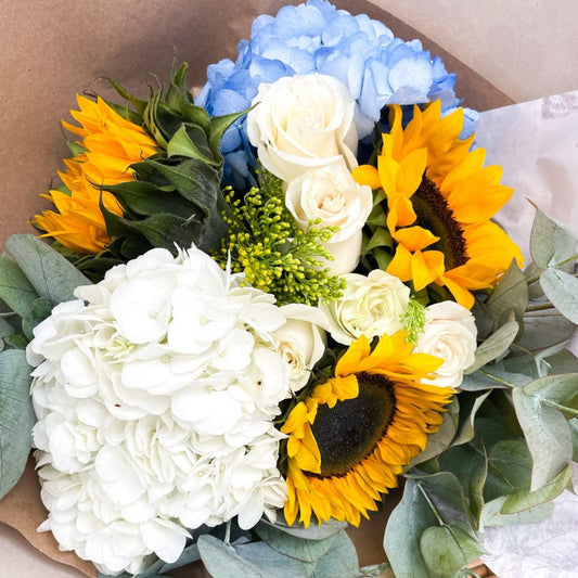 ramos de rosas con girasoles y Hortencias